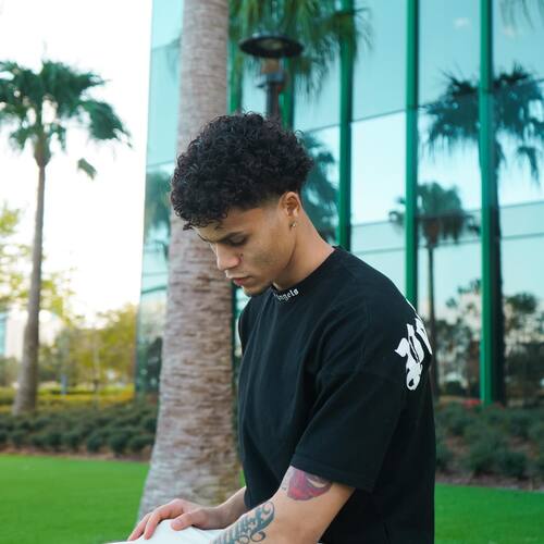 picture of Ason Figueroa in a black t-shirt